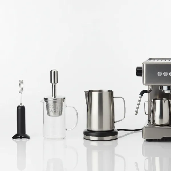 Various types of milk steamers: handheld, manual pump, automatic electric jug, and professional espresso machine steam wand.