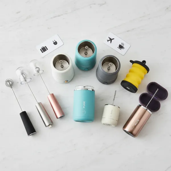 A collection of various portable milk frothers highlighting different features and designs for travel.